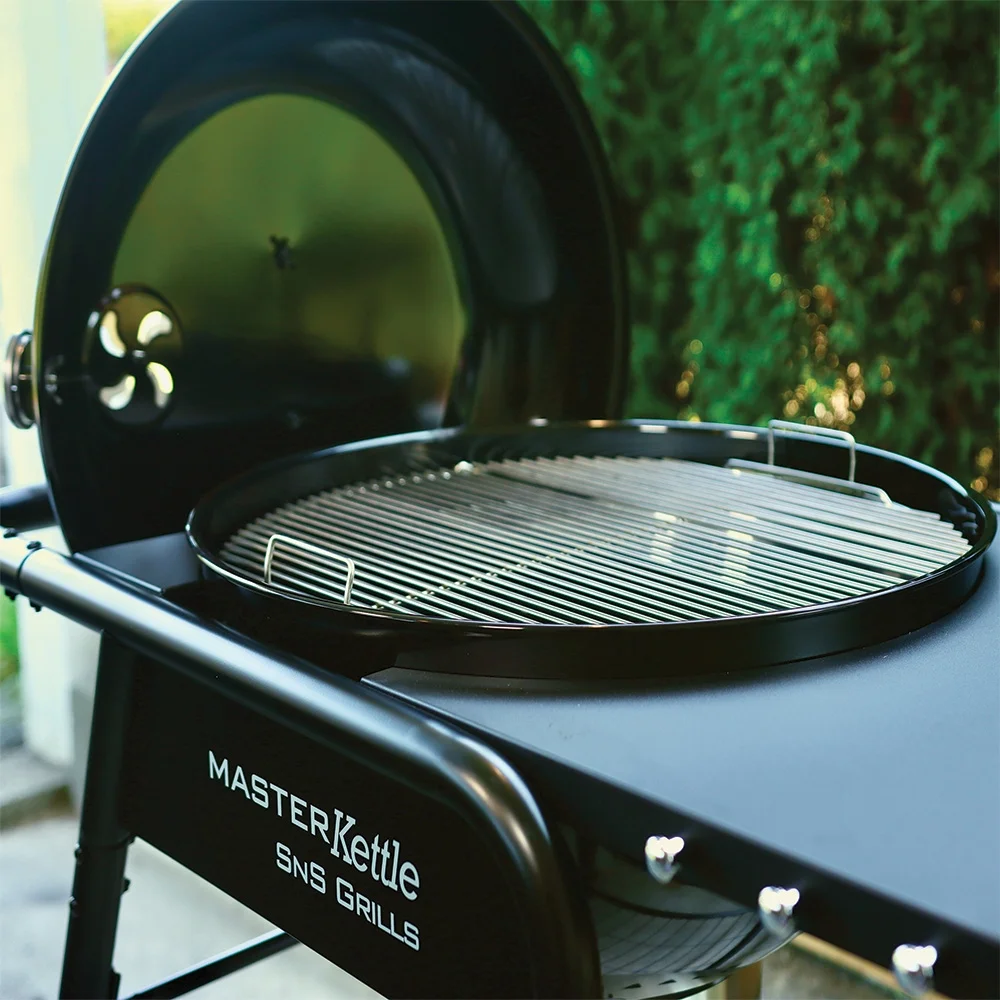 slow ‘n sear® masterkettle charcoal grill + smoker – 22″ kettle grill with grill cart and built in side table slow ‘n sear® masterkettle charcoal grill + smoker – 22″ kettle grill with grill cart and built in side table